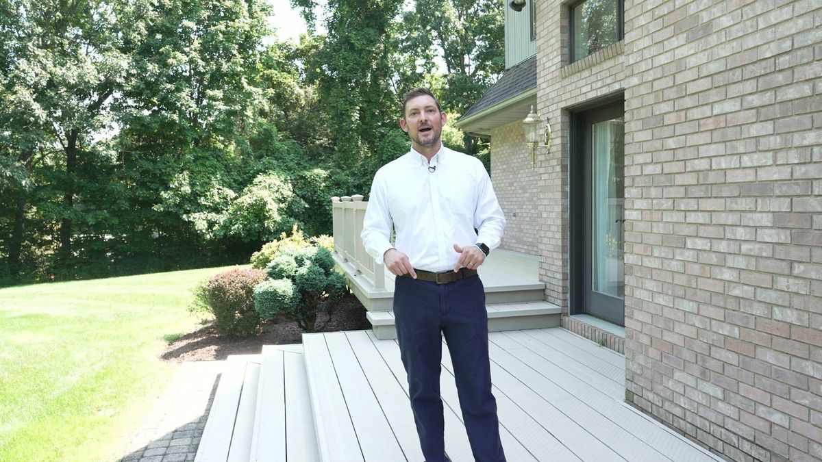 Nick DeLuca presents outside on the deck