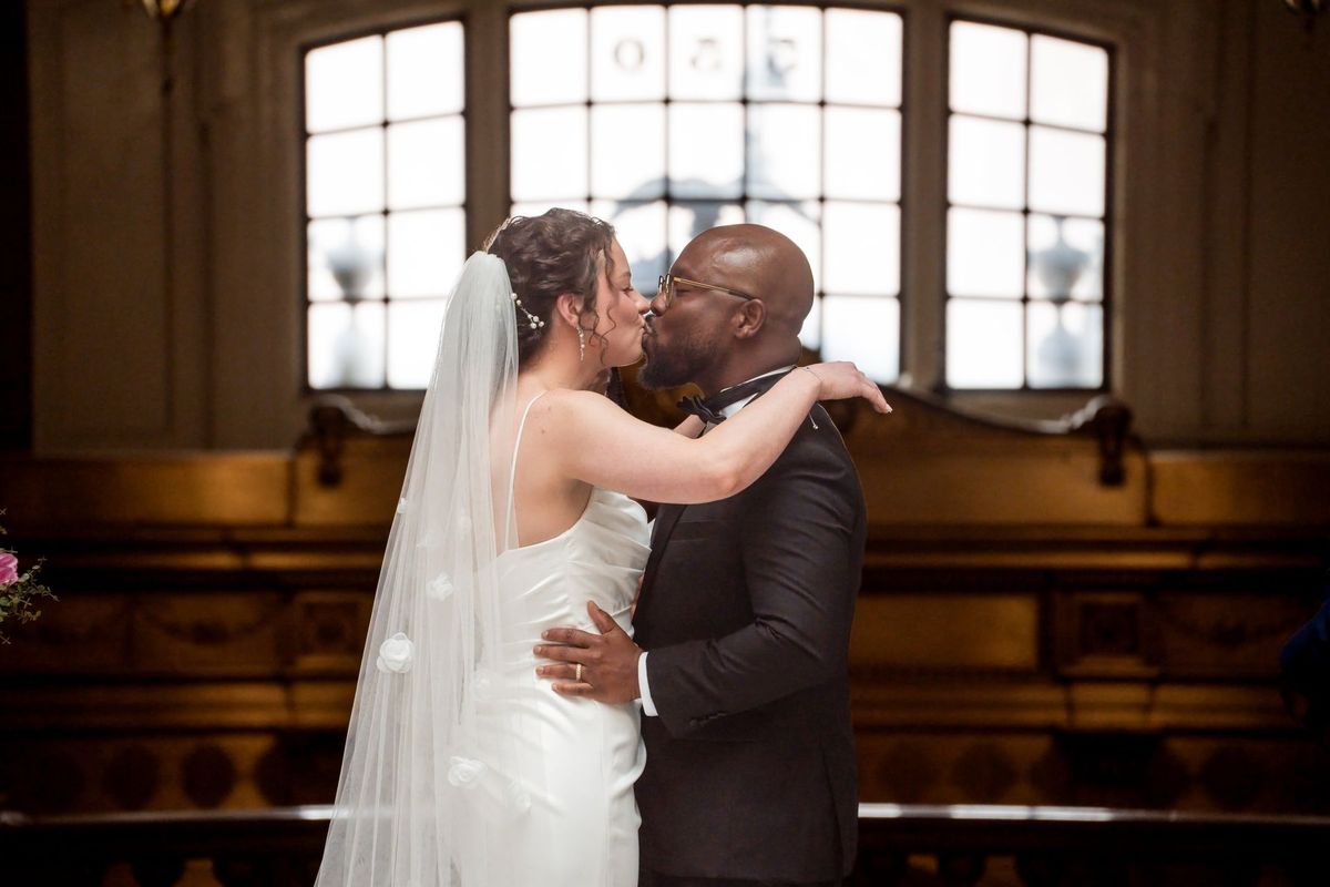 Christina and Tajay share a kiss during their City Hall ceremony