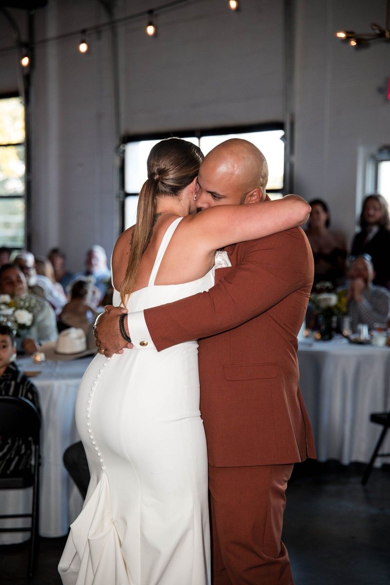 Jacob and Thea embrace during their first dance