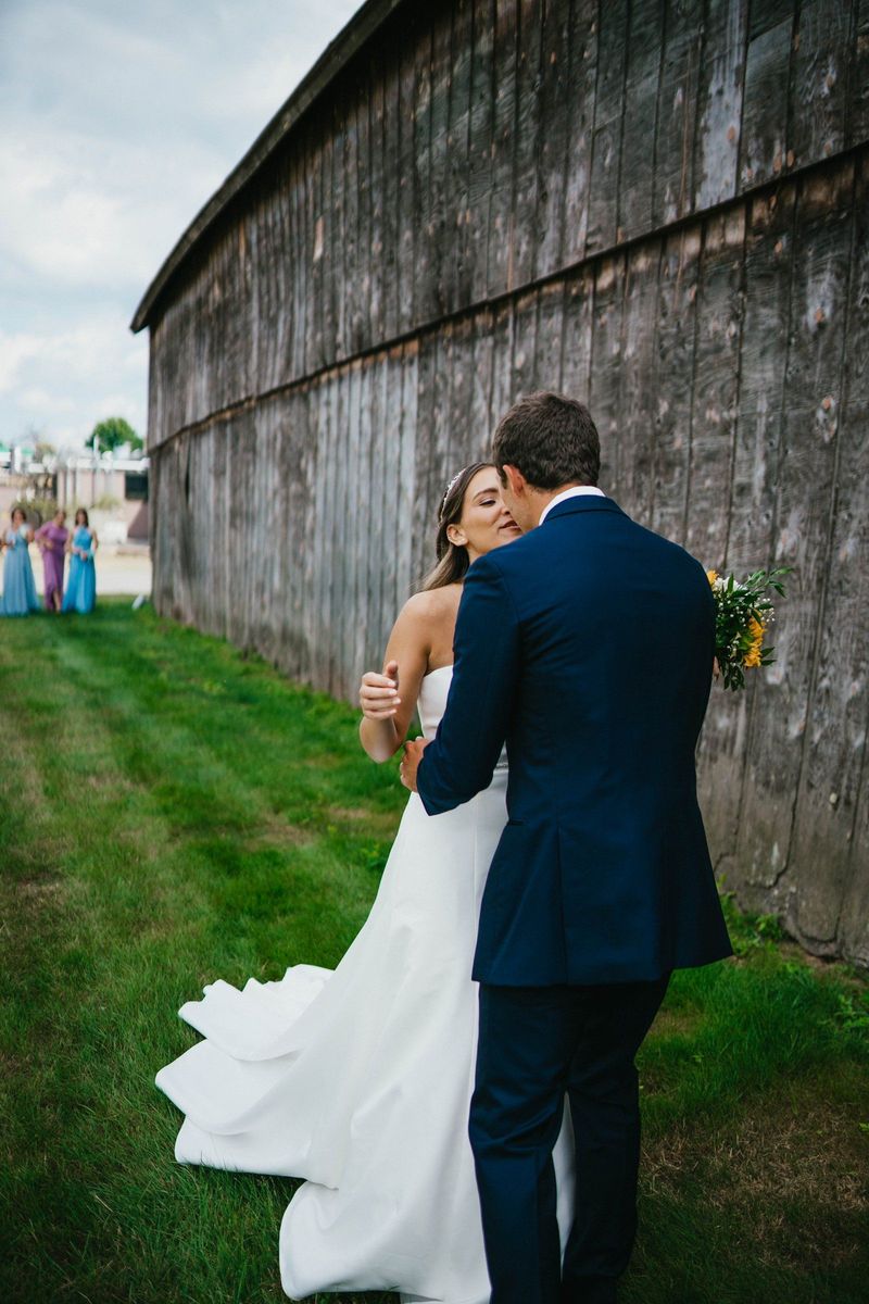 Mariana and Max embracing during their first look
