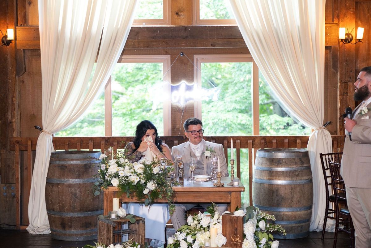 Sadie and Mat react together during the wedding speeches