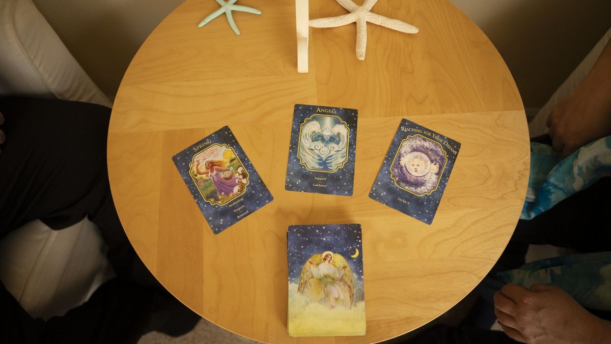 Decorated cards laid out on a round wooden table