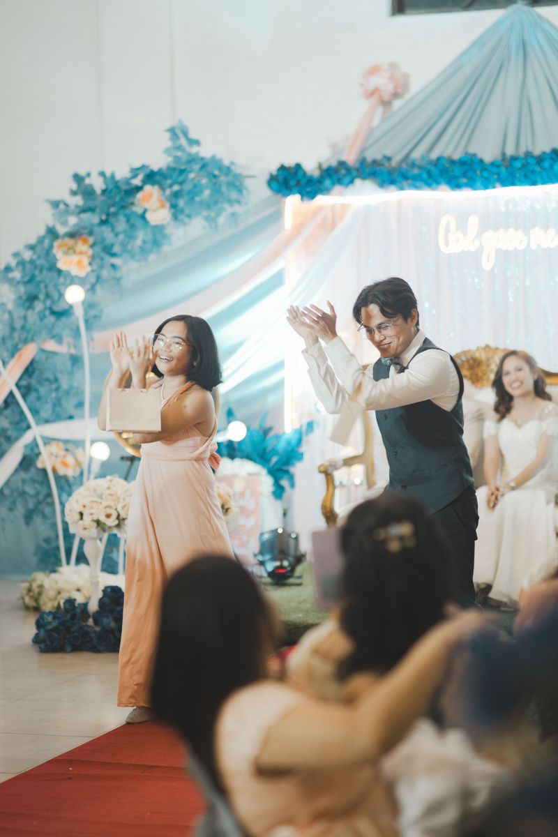 A bride and groom dancing during a wedding reception