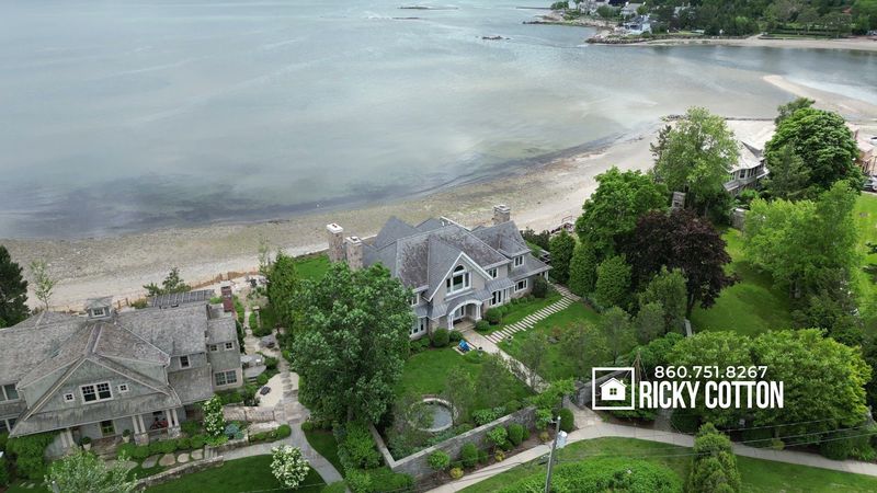 Aerial view of the waterfront property and shoreline in Westport