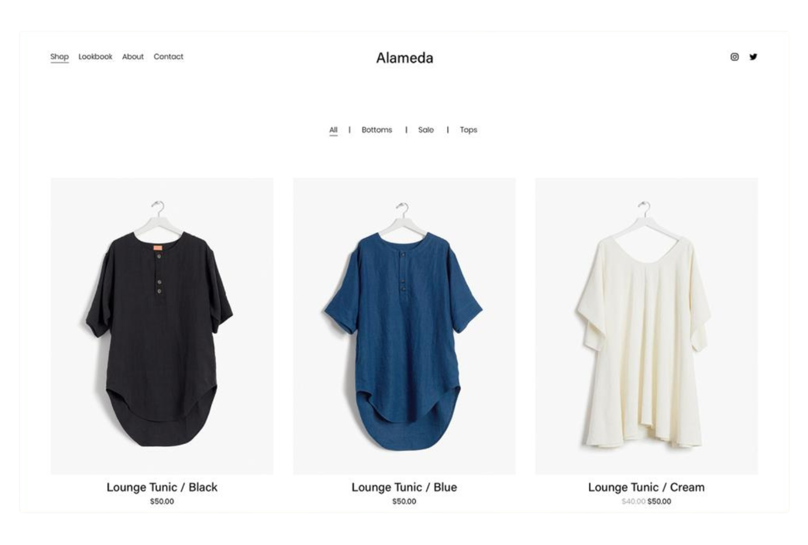 Three shirts are hanging on a hanger on a website.