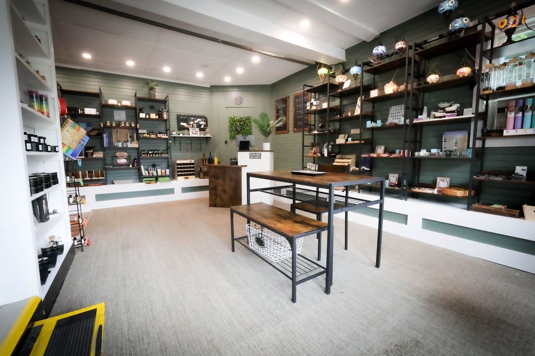 A store filled with lots of shelves and tables.