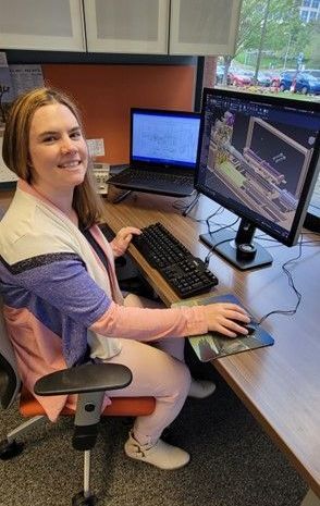April Shore at her desk in Nashville TN working on a engineering project.