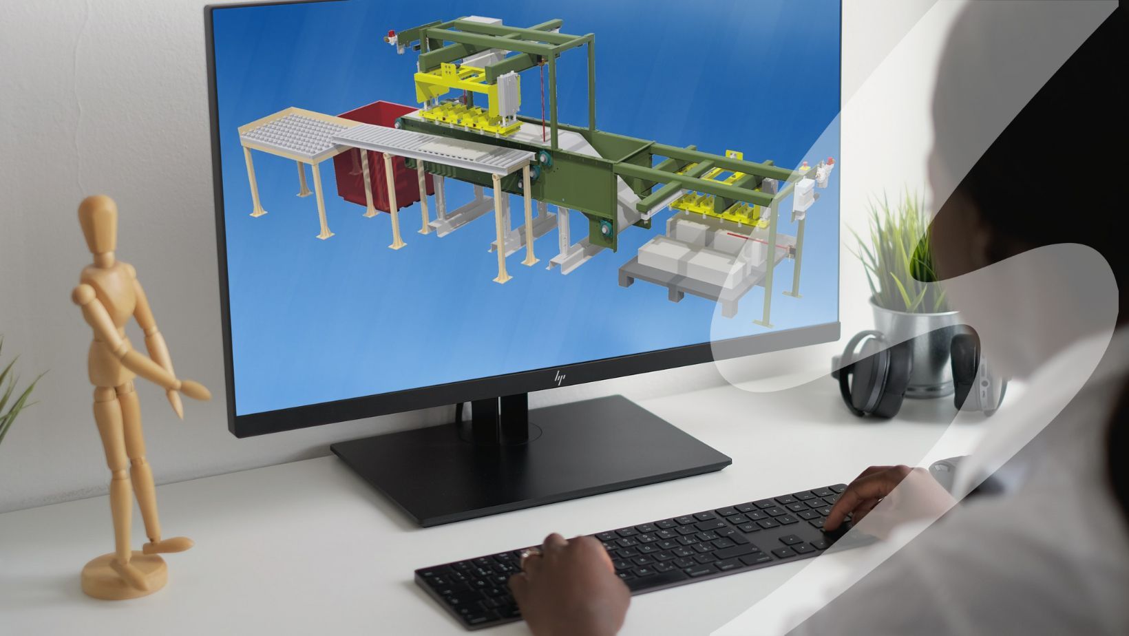 Engineer reviewing AutoCAD drawing on computer