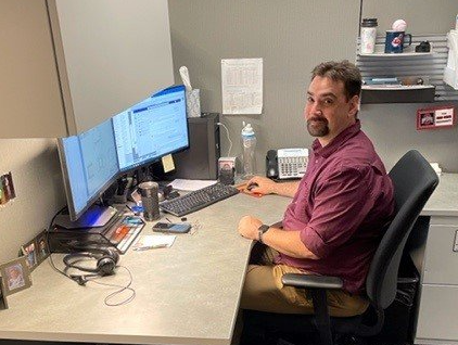 Eric Norris at his desk.
