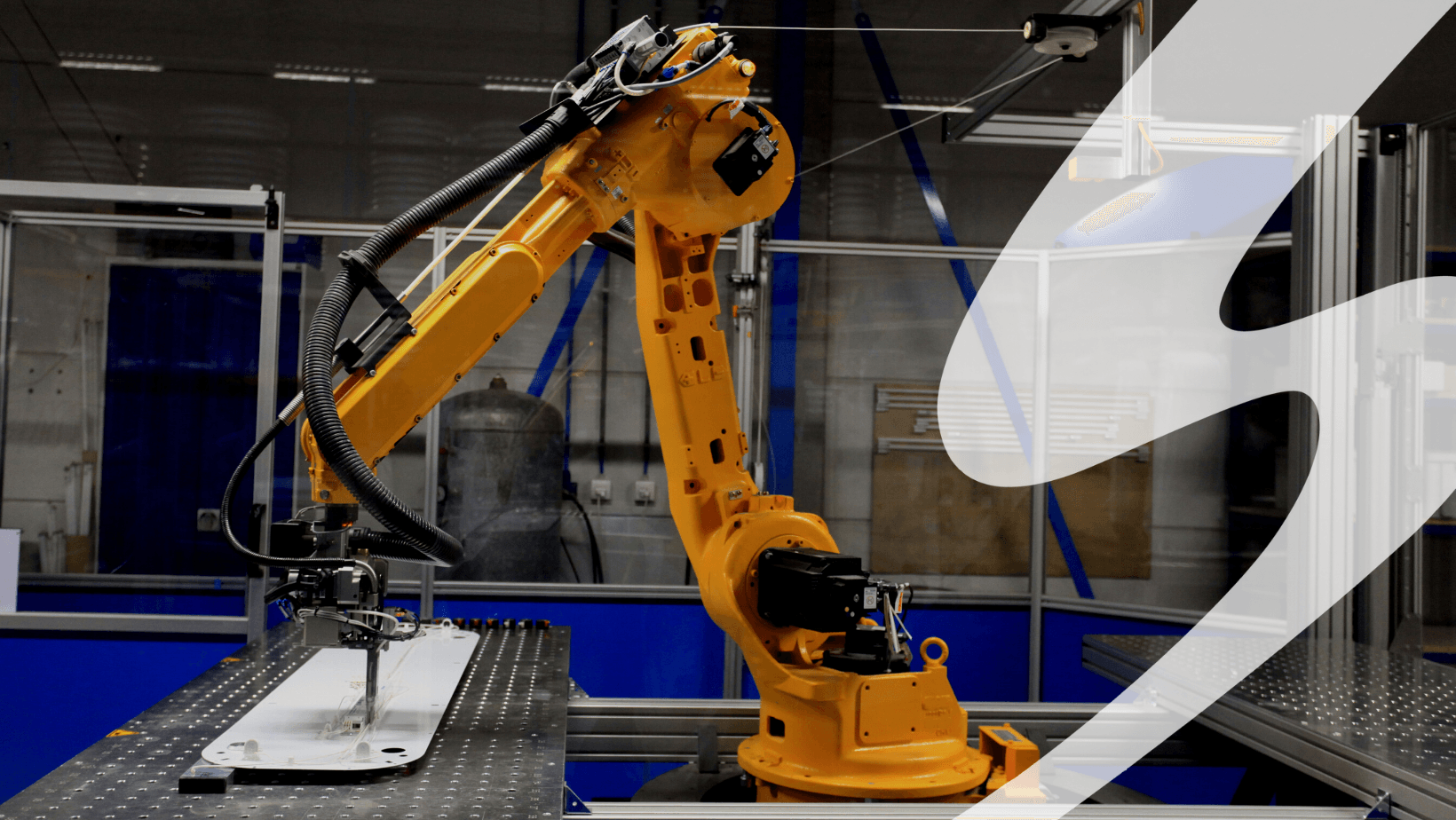 A yellow robotic arm