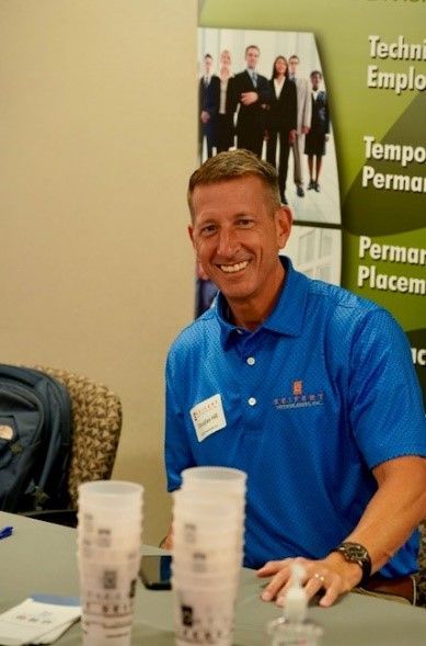A smiling Seifert employee.