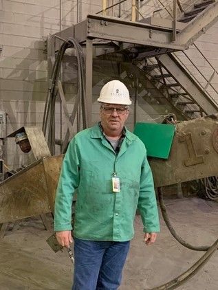 Rich Reed working in a plant for Seifert Techologies