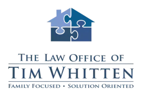 Logo for The Law Office of Tim Whitten featuring a house made of four puzzle pieces in blue shades and text below.