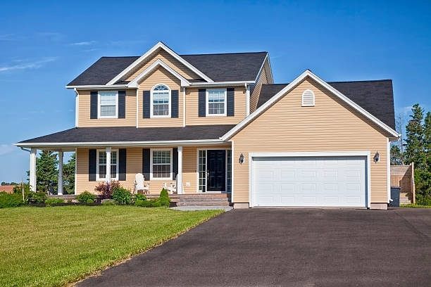 House With a White Garage Door — Bear, DE — Smith Paving & Contracting, Inc.