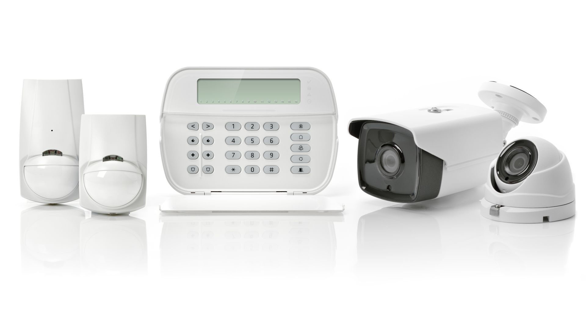 Commercial business security system components including motion sensors, a keypad control panel, and surveillance cameras Commercial business security system components including motion sensors, a keypad control panel, and surveillance cameras