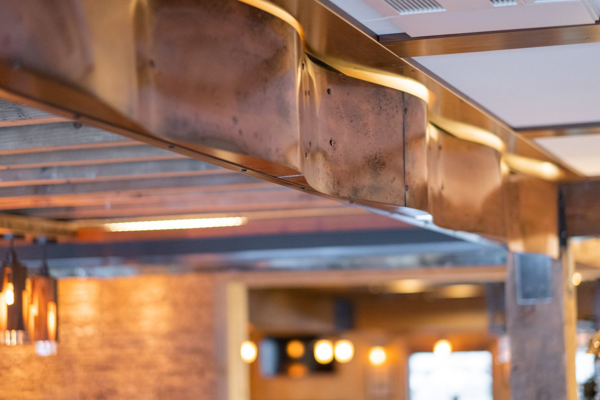 A close up of a wooden beam in a restaurant.