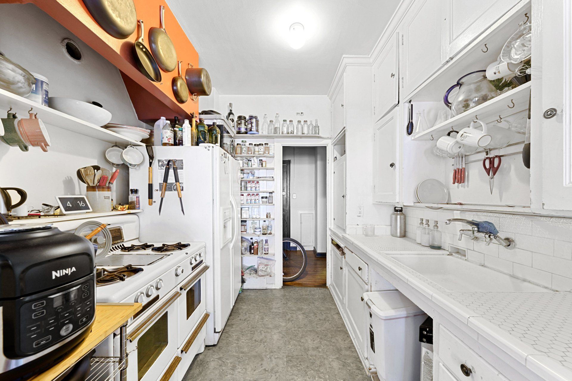 15 Eastwind St Kitchen with White Cabinets
