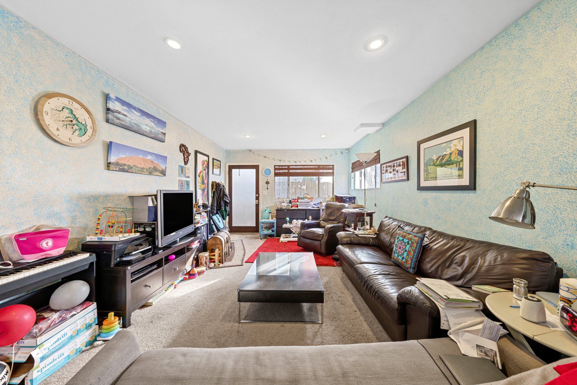 25 Eastwind St Living Room with Large Couches