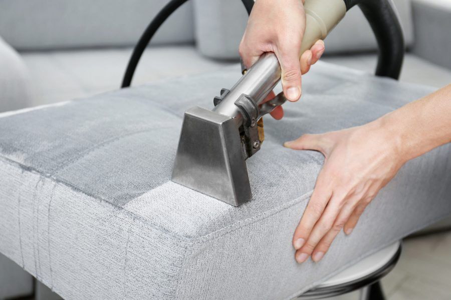 grouting-ceramic-tiles-tilers-filling-space-tiles-using-rubber-trowel.