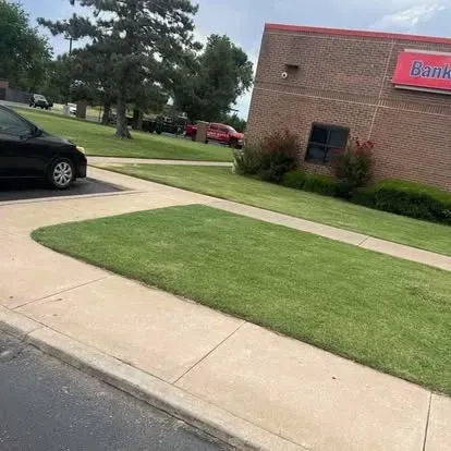 Professional grass cutting in Oklahoma City neighborhood