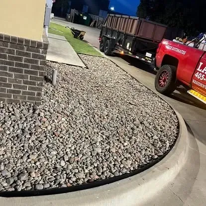 Decorative rock installation in Oklahoma City yard