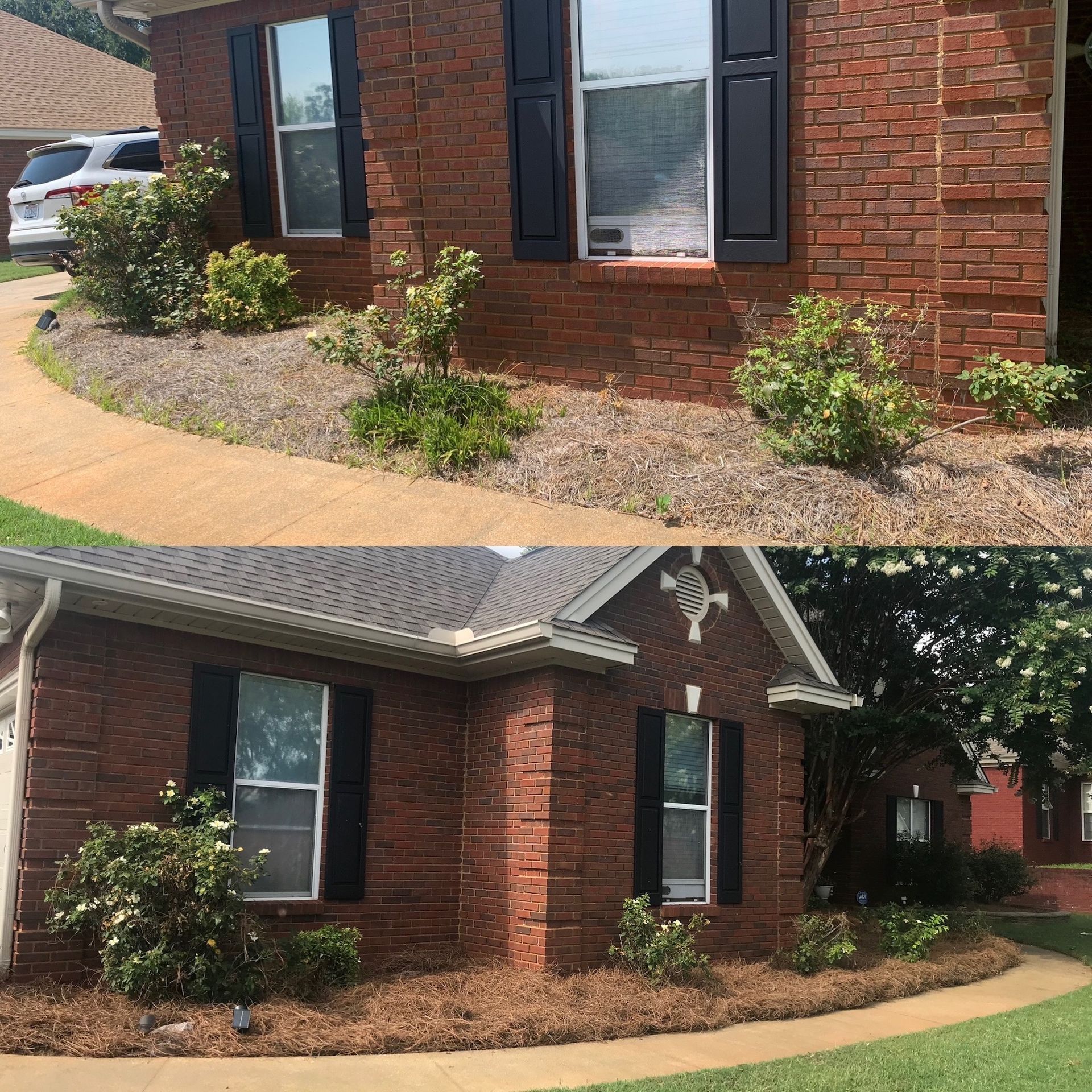 Brick house exterior with black shutters and a curved sidewalk bordered by small shrubs.
