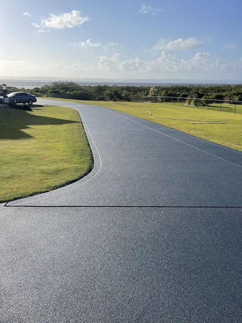 An Empty Room with White Walls and A Marble Floor — Fraser Coast Waterproofing in Pialba, QLD