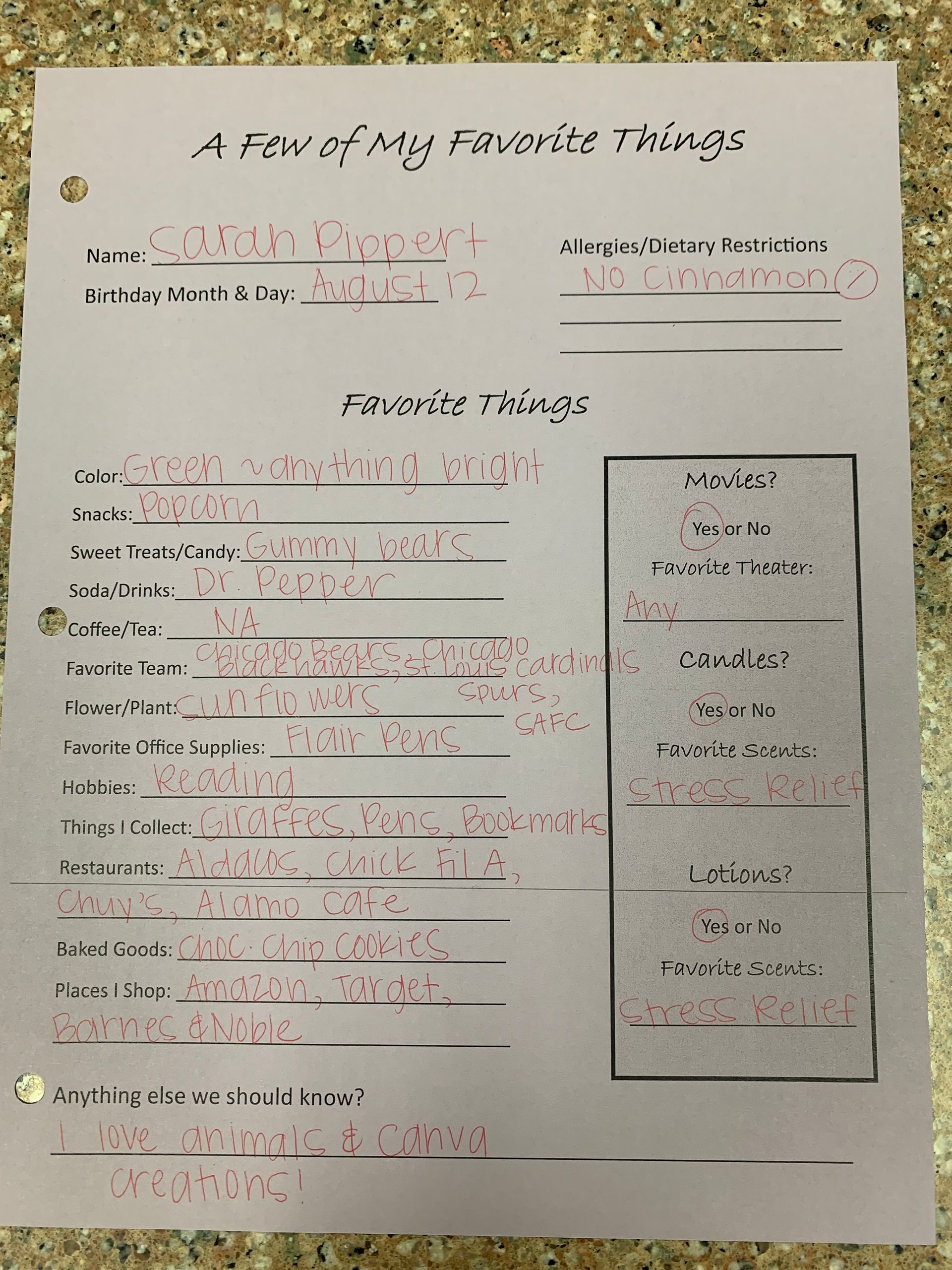 Handwritten school worksheet on white paper with pink pen markings and a small boxed section on the right