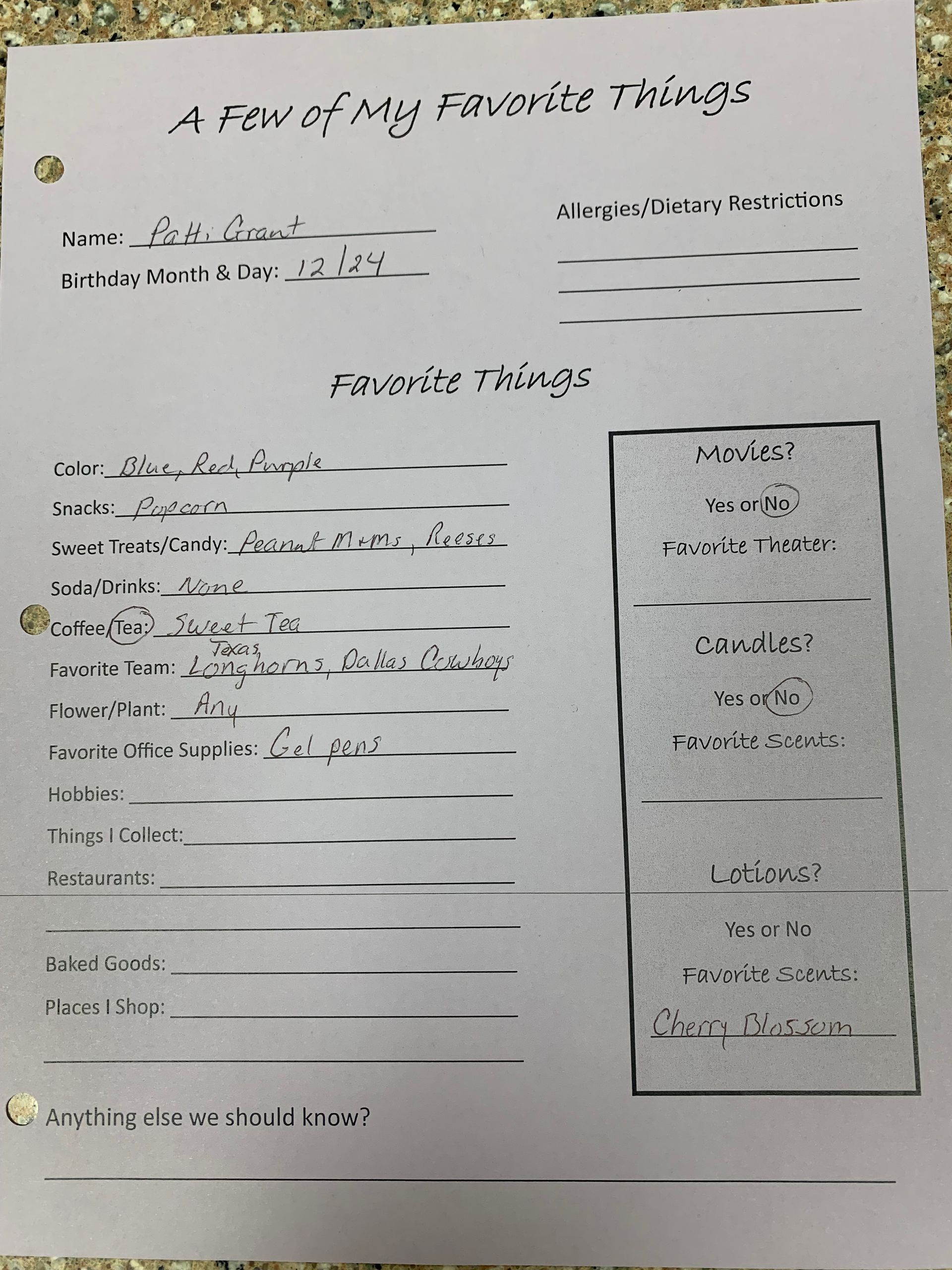 Handwritten worksheet on white paper with a boxed section and lines for answers.