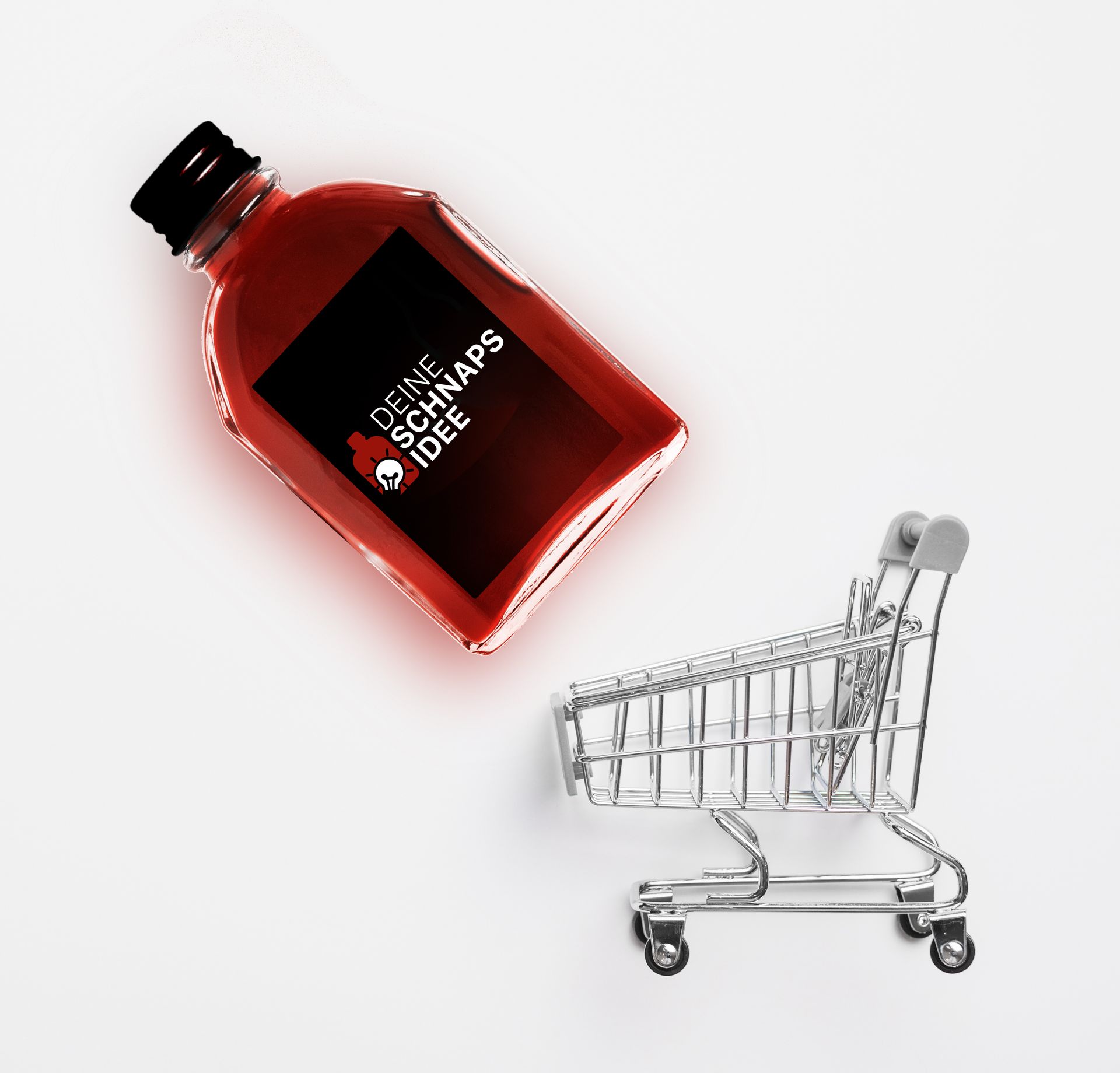 Eine Flasche mit roter Flüssigkeit neben einem Einkaufswagen