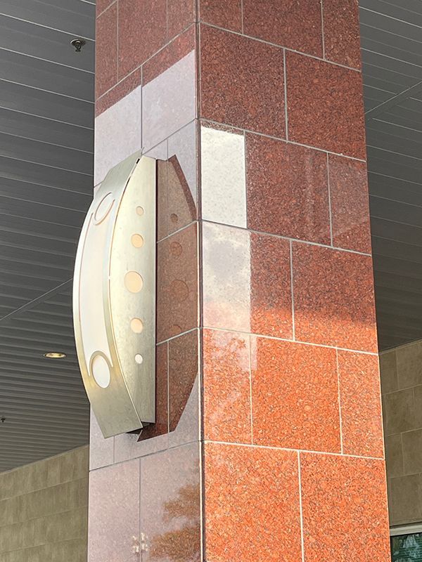 circular design for metal lamp at commercial property
