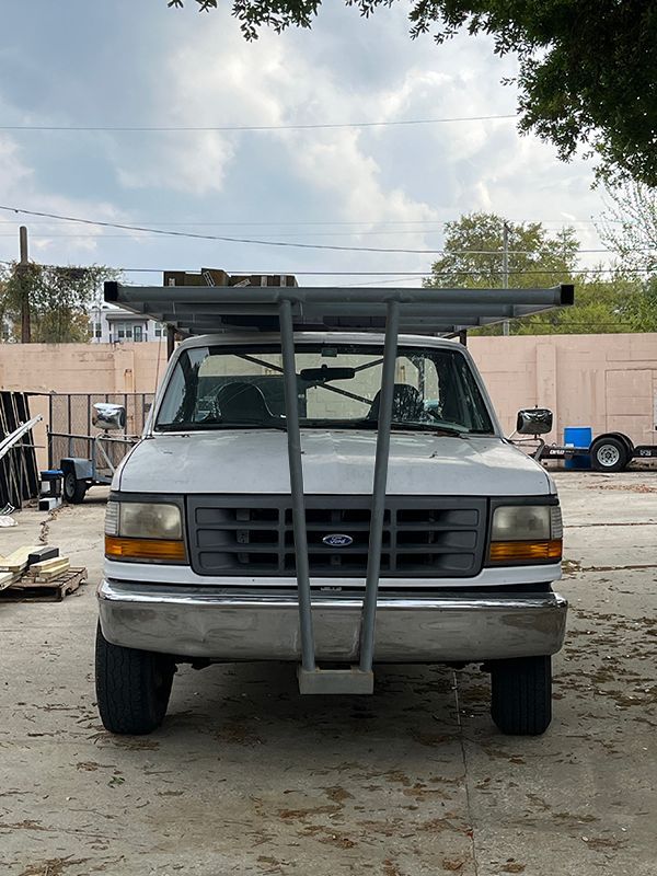 overhead welded rack attached to truck for lumber