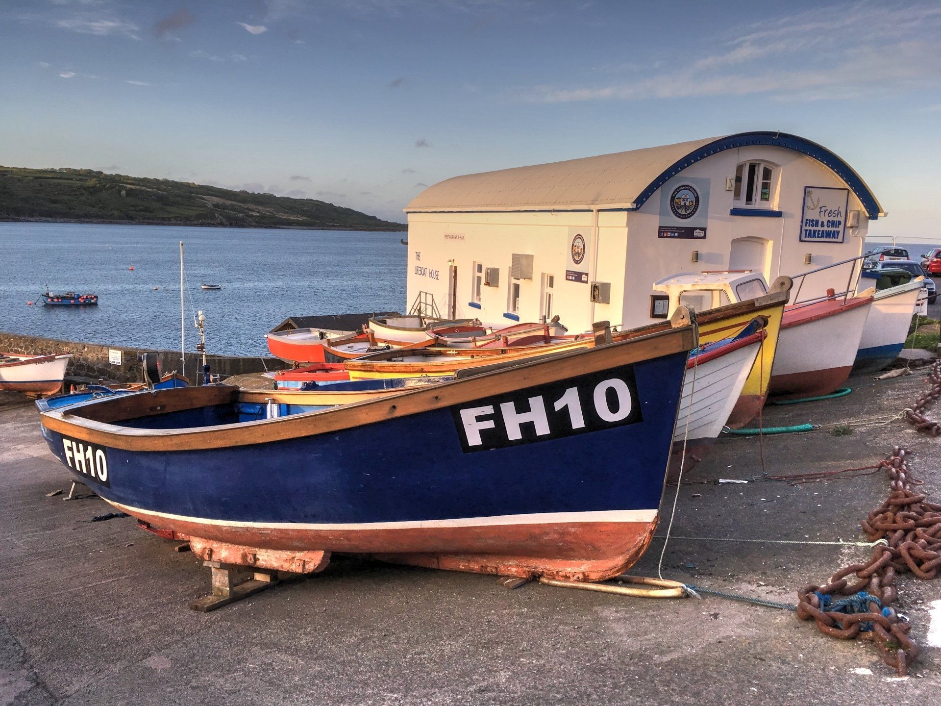 Scenic view of Coverack harbour in Cornwall with fishing boats