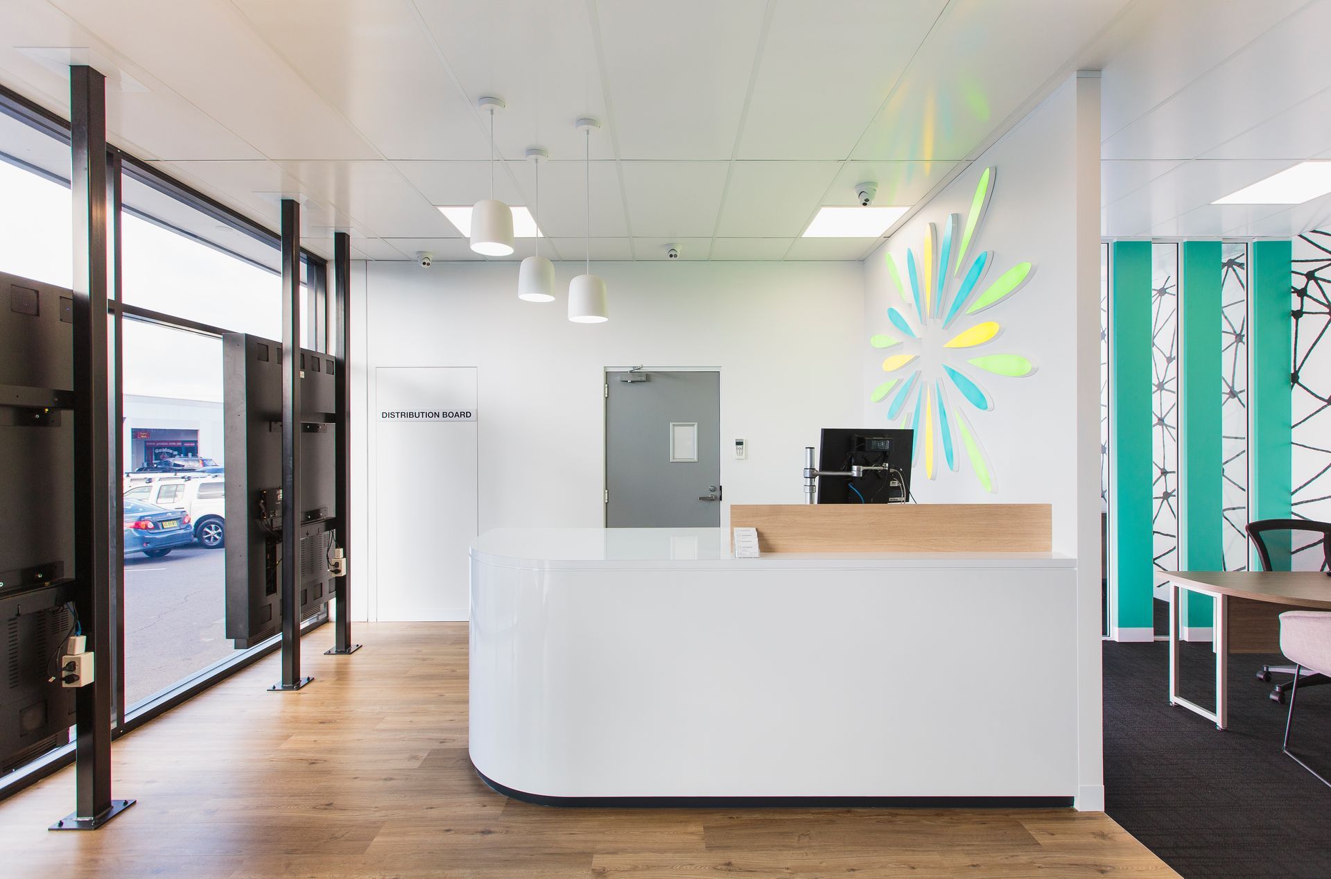 Modern Office Reception Area With White Curved Desk — ATH Projects in Kirrawee, NSW