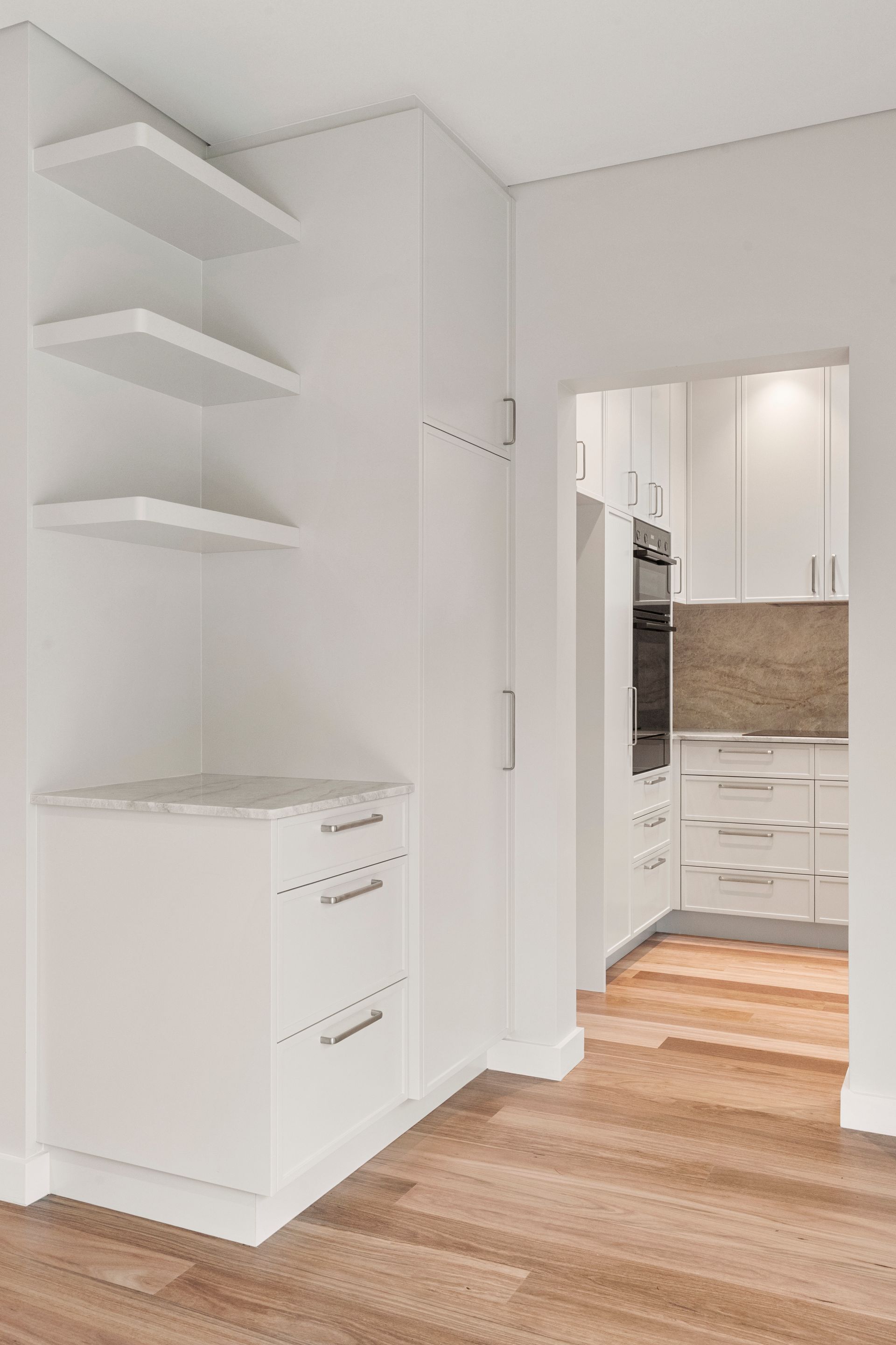 White Built-in Kitchen Storage Unit With Open Shelves and Drawers — ATH Projects in Mosman, NSW