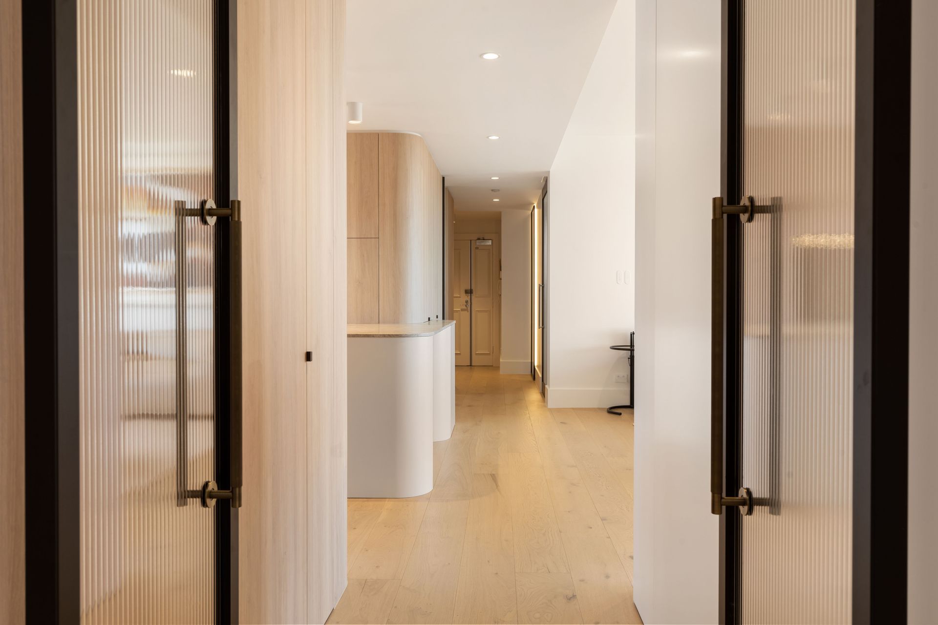 Open Doorway Leads to a Hallway With Light Wood Floors and Walls — ATH Projects in Drummoyne, NSW