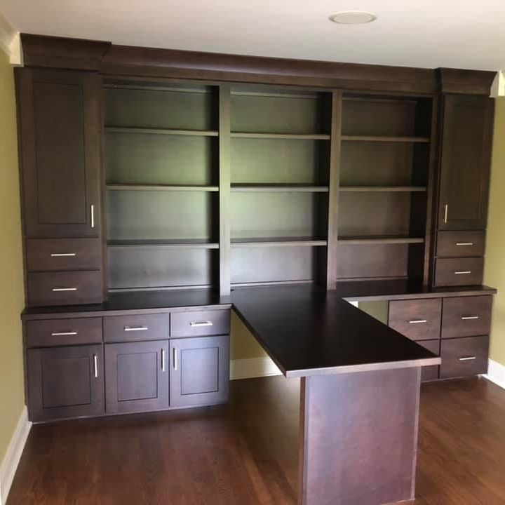A & R Home Services remodel room with a desk and shelves