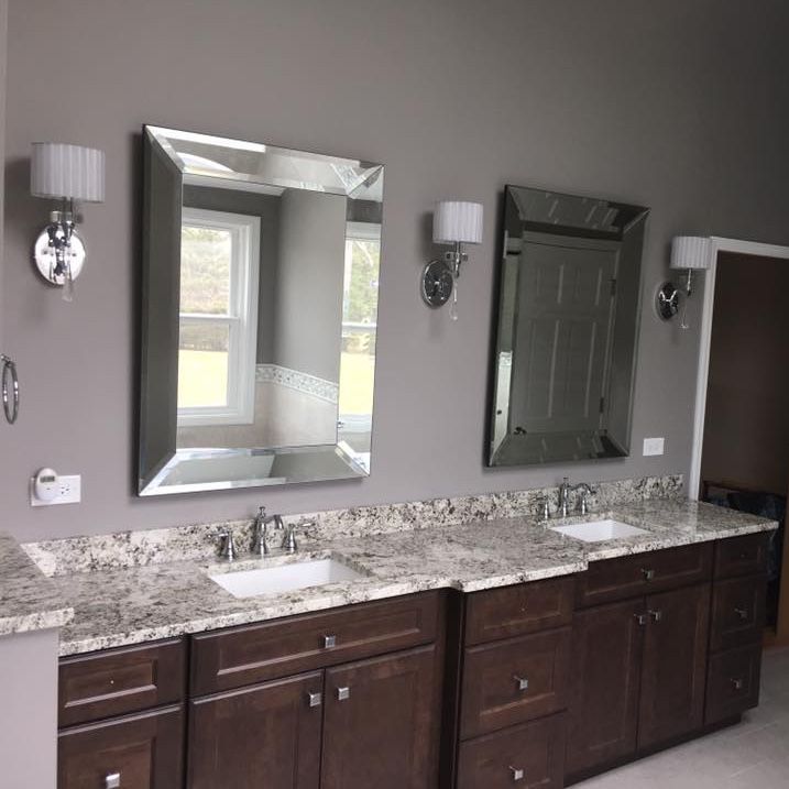 A & R Home Services  bathroom with two sinks and two mirrors