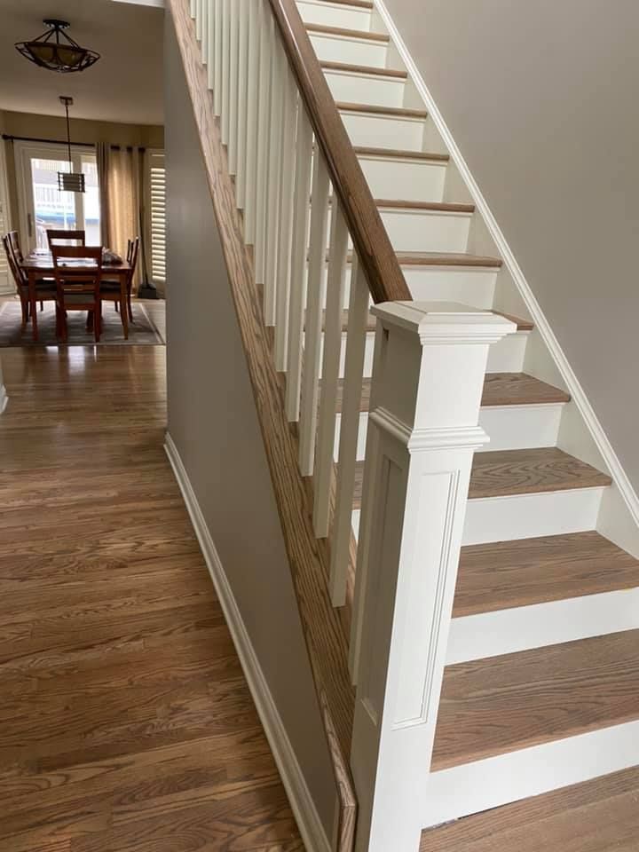 A & R Home Services remodel staircase leading up to a dining room 