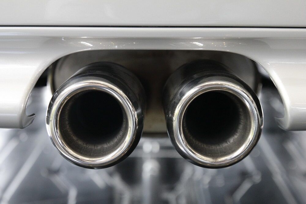 A Close Up Of The Exhaust Pipes Of A Car — Carite Auto Repairs In Warana, QLD