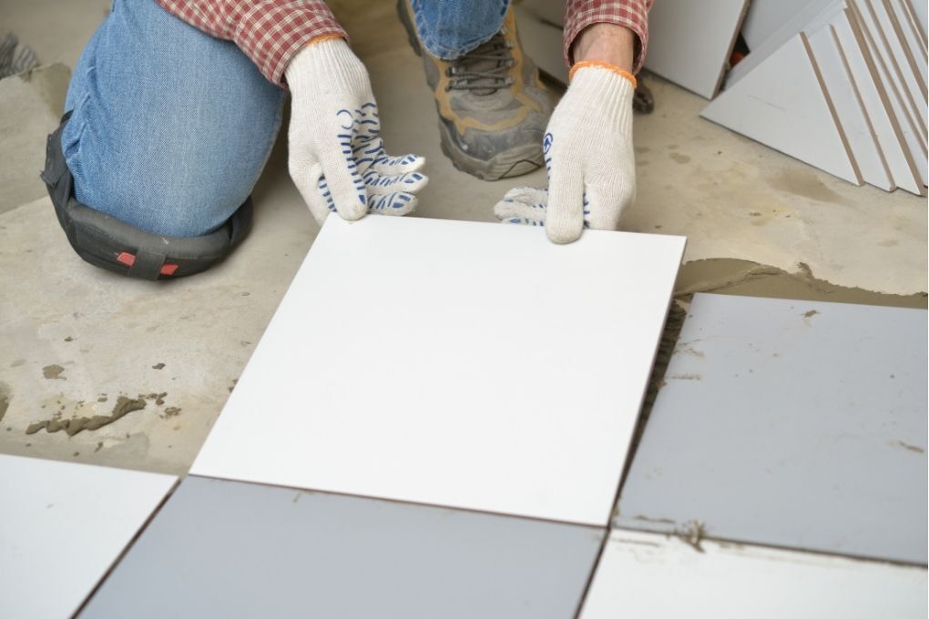 Flooring Nottingham fitting ceramic floor tiles in a kitchen in Nottingham