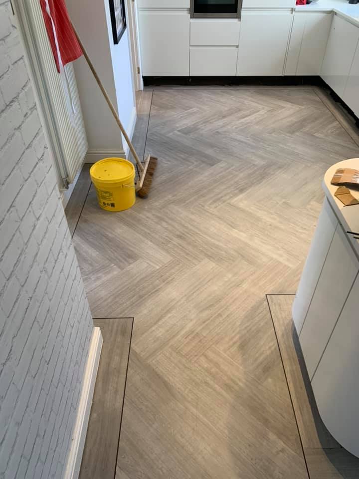 Light oak coloured engineered parquet flooring installed in a kitchen in Nottingham