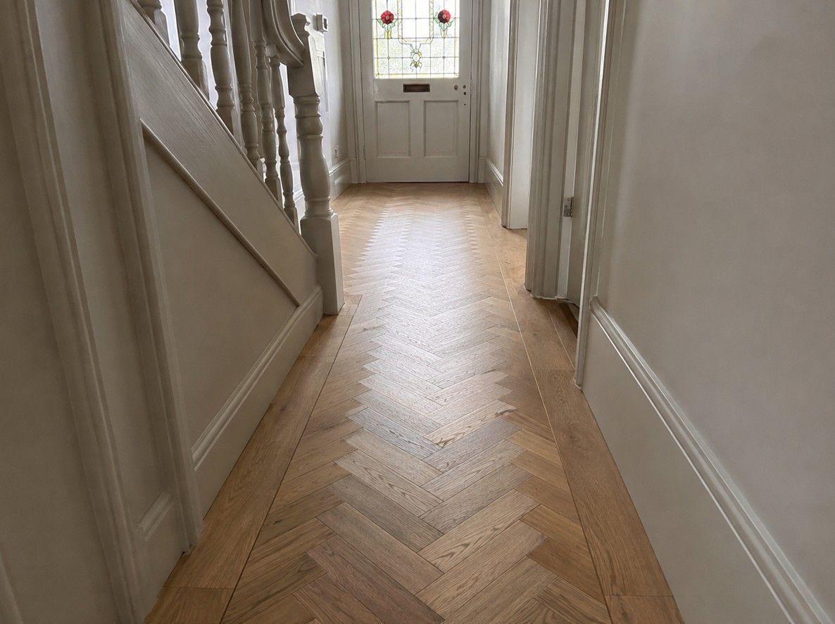 Engineered oak herringbone flooring fitted in a Nottingham hallway