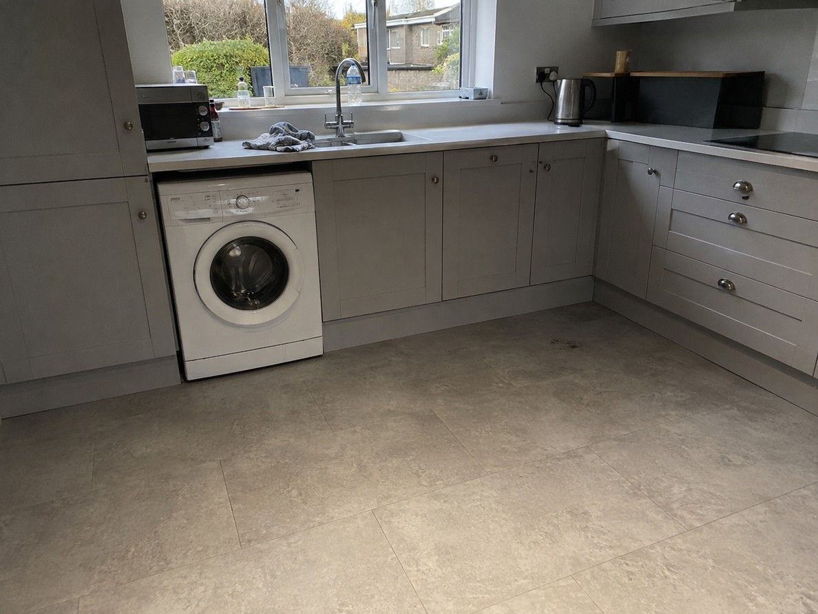 Stone-effect LVT flooring fitted in a West Bridgford kitchen