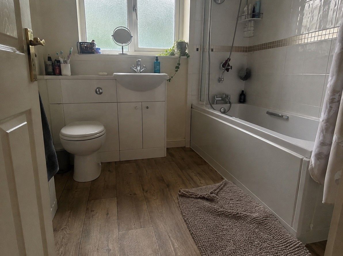 Waterproof wood effect LVT flooring fitted in a Nottingham bathroom