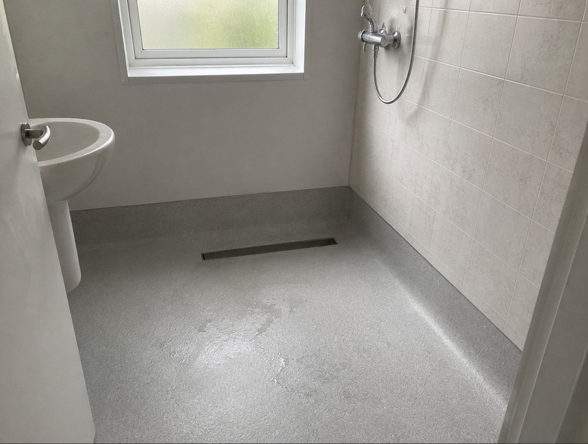 Non-slip safety vinyl with cap coving fitted in a Nottingham wet room