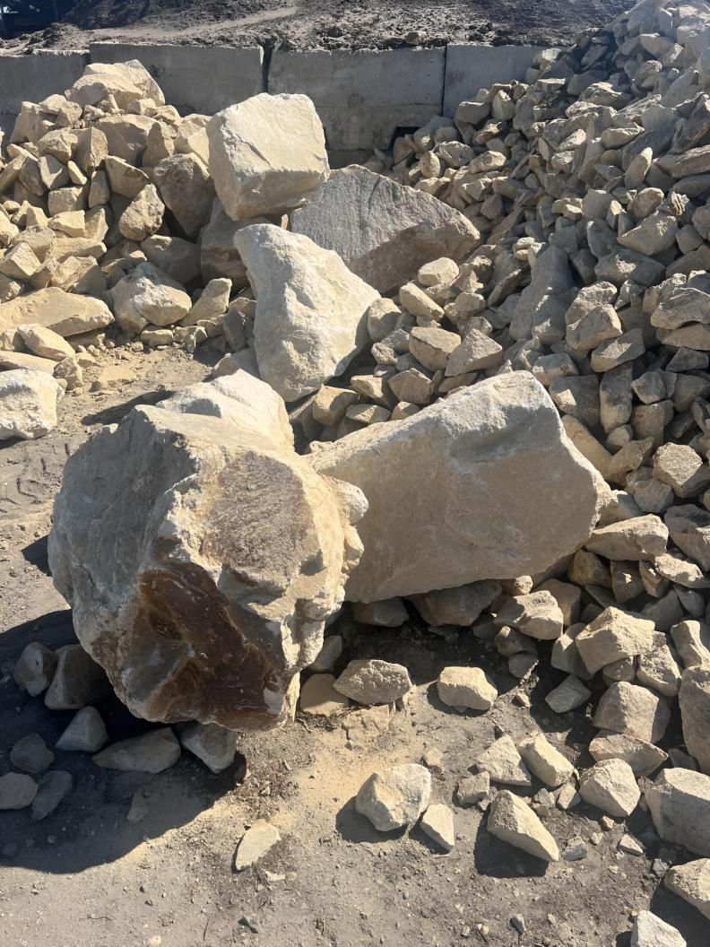 A Large Rock is Sitting on Top of a Pile of Rocks — Manning Valley Landscapes in Forster, NSW