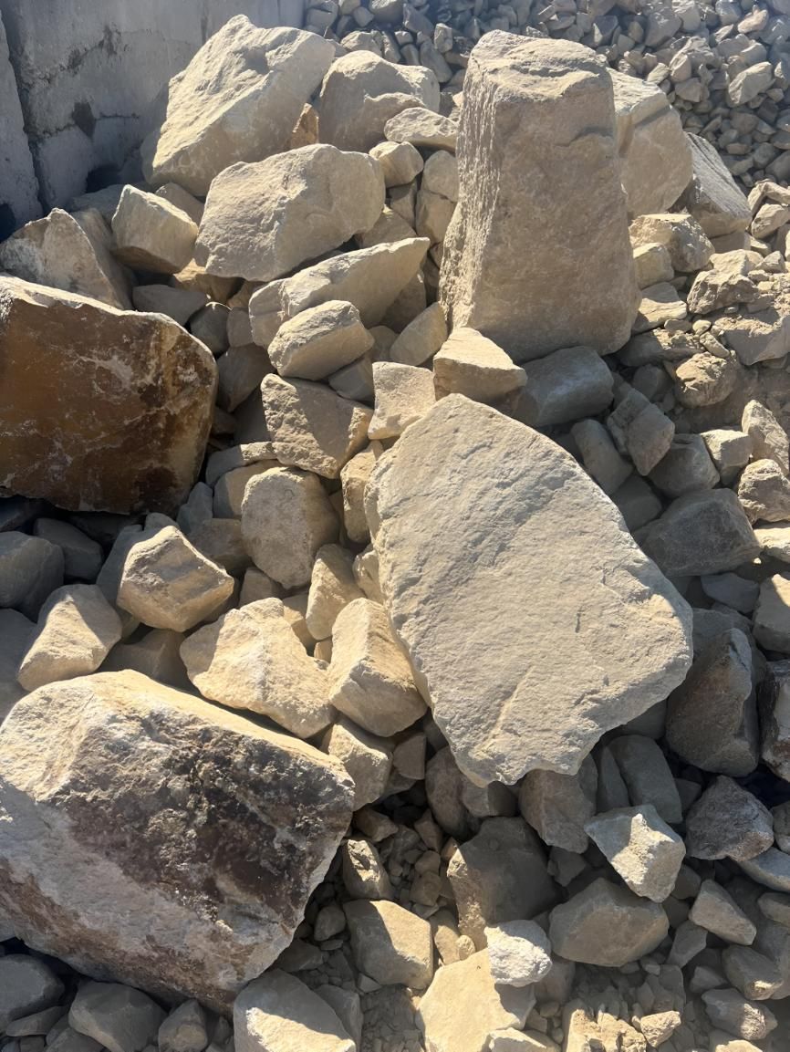 A Pile of Rocks Sitting on Top of Each Other on the Ground — Manning Valley Landscapes in Coolongolook, NSW