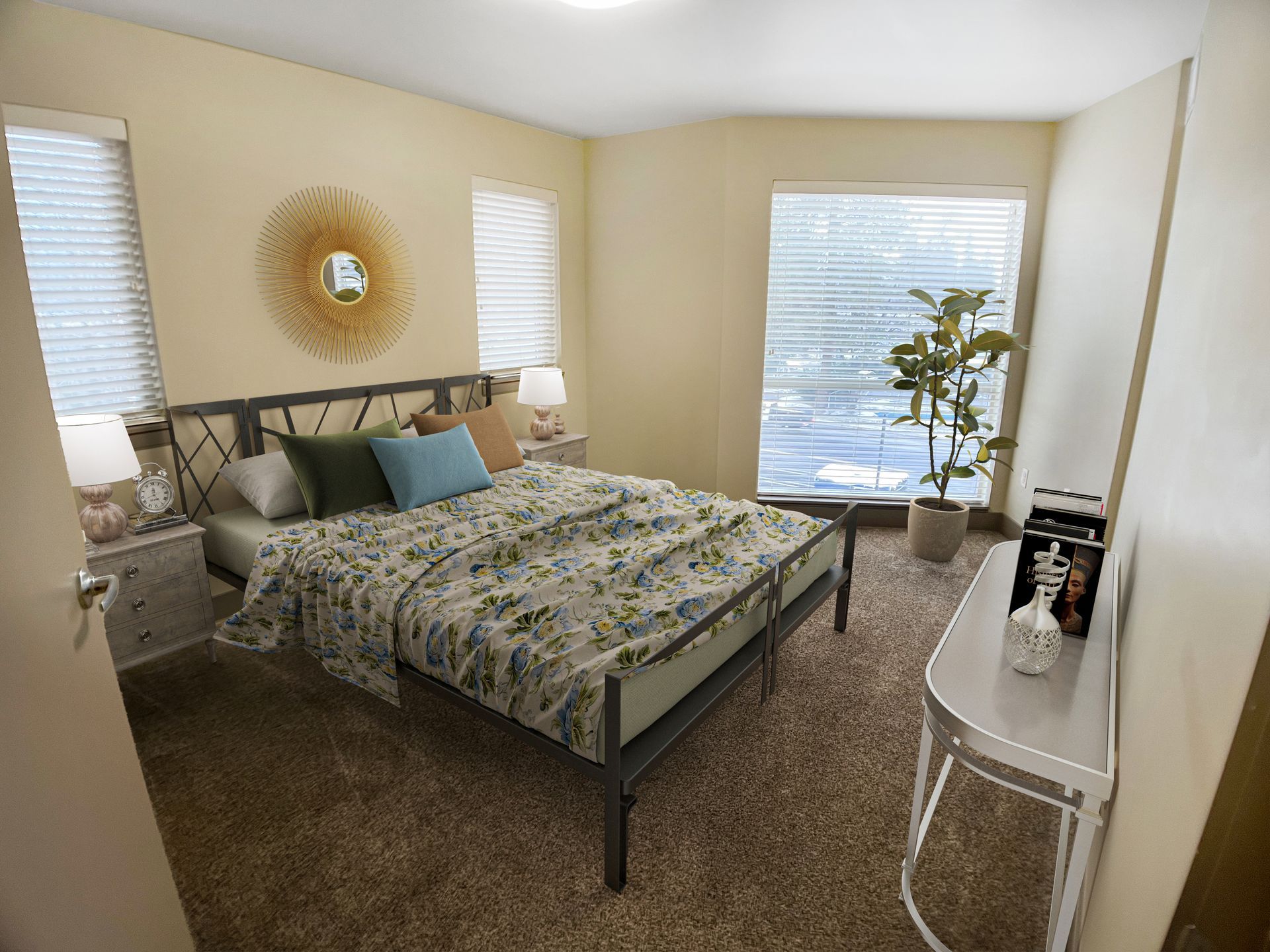 A bedroom with a large bed and a window.