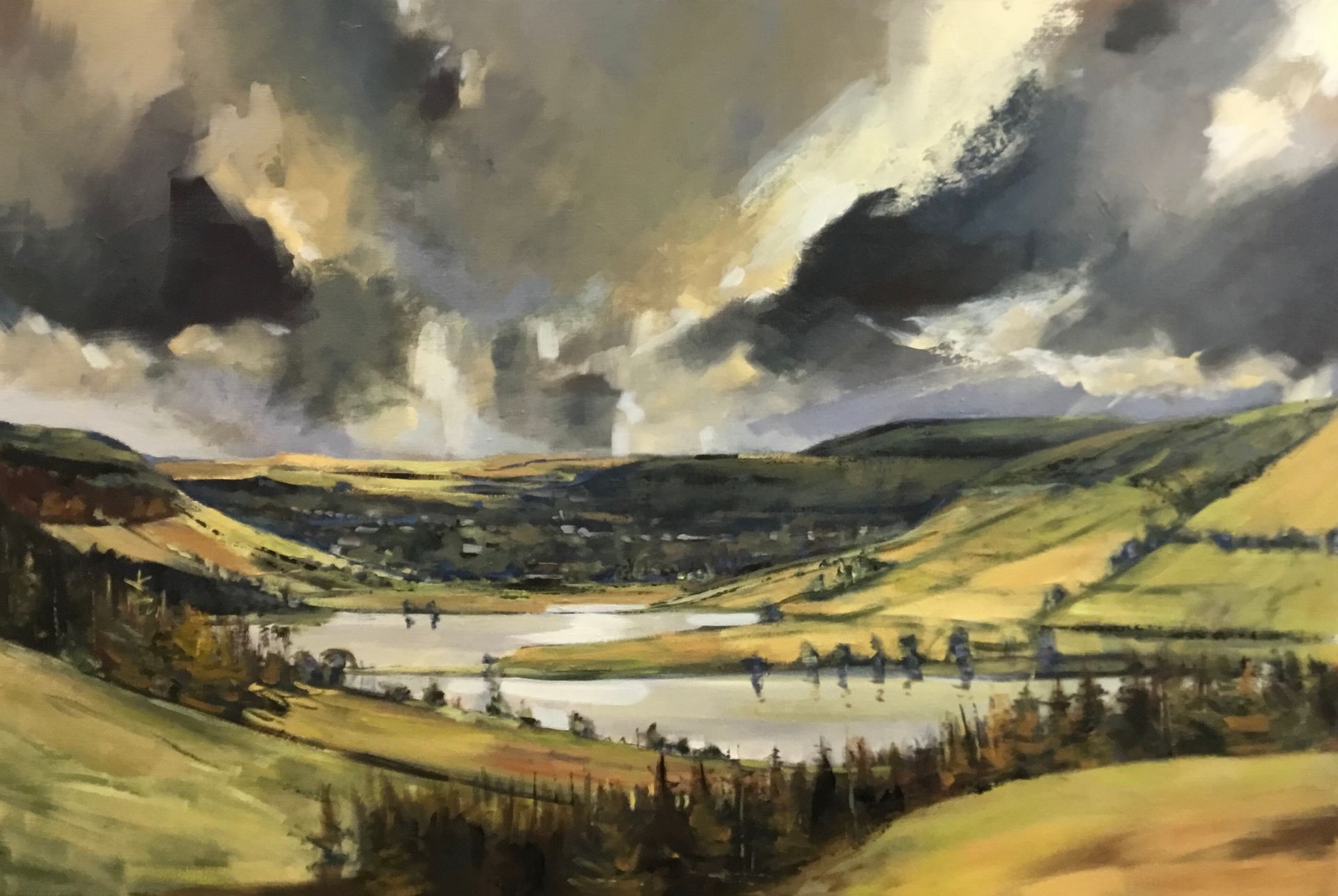 A painting of a lake surrounded by mountains and trees under a cloudy sky.
